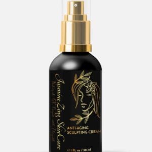 A bottle of anti aging facial cream with gold foil.