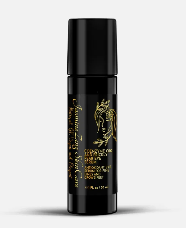 A black bottle of lotion with gold writing.