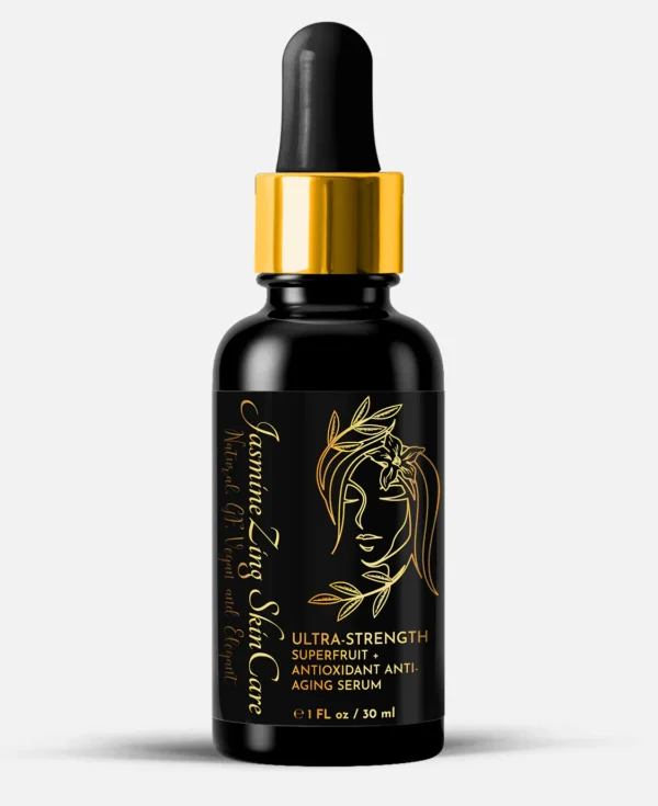 A bottle of serum with a gold label